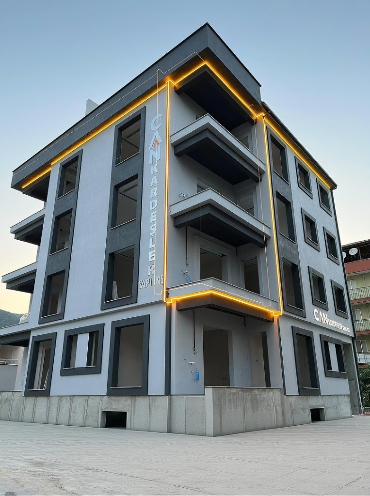 Can Kardeşler Yapı ve İnşaat — LED aydınlatmalı modern konut binası